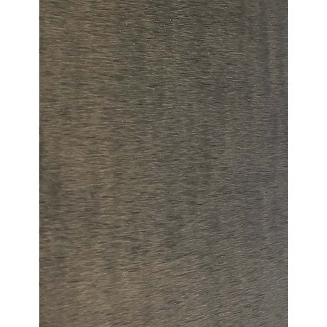 The Gong side table by Romeo Sozzi for Promemoria is a masterpiece of material restraint — a perfectly square, low table...