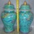 A beautiful pair of Chinese enameled porcelain "General Jars." These vibrant vessels feature a turquoise ground decorated...