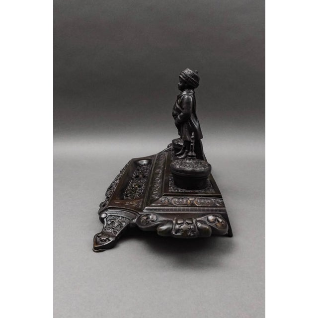 Maitland Smith Vintage Ornate Heavy Cast Bronze Desk Double Ink Well With Child. Measures approximately 19 7/8" long, 8...