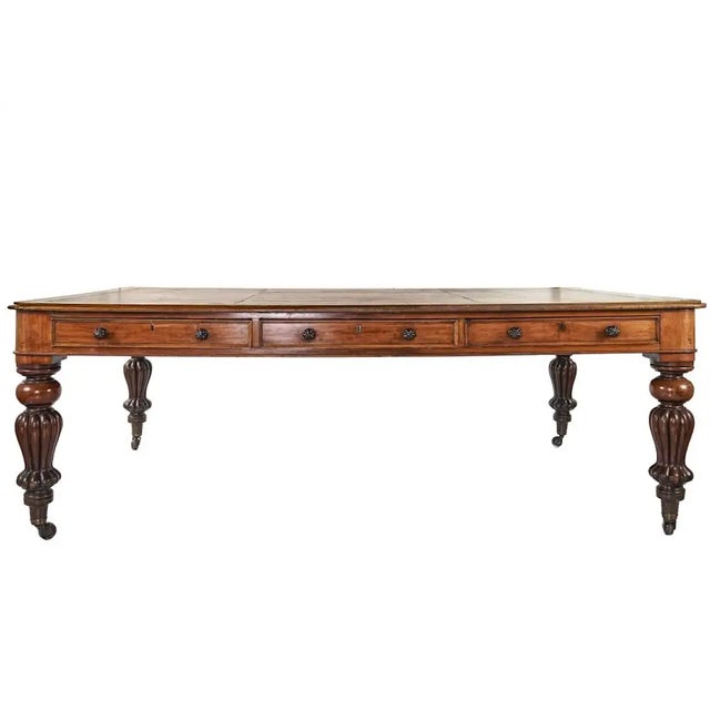 Period Early 19th Century English Regency Leather Top Partners Desk or Library Table. Three Drawers each on opposite long...