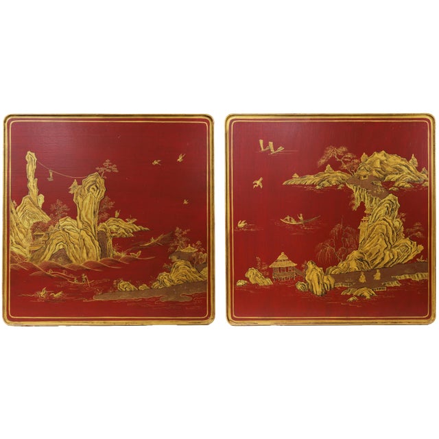 Pair of vintage chinoiserie side tables, finished in deep red lacquer and decorated with gilt hand-painted landscape...