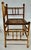 Charming English Colonial burnt bamboo corner char. Can be used as a shelf or plan-stand. Great condition , very solid.