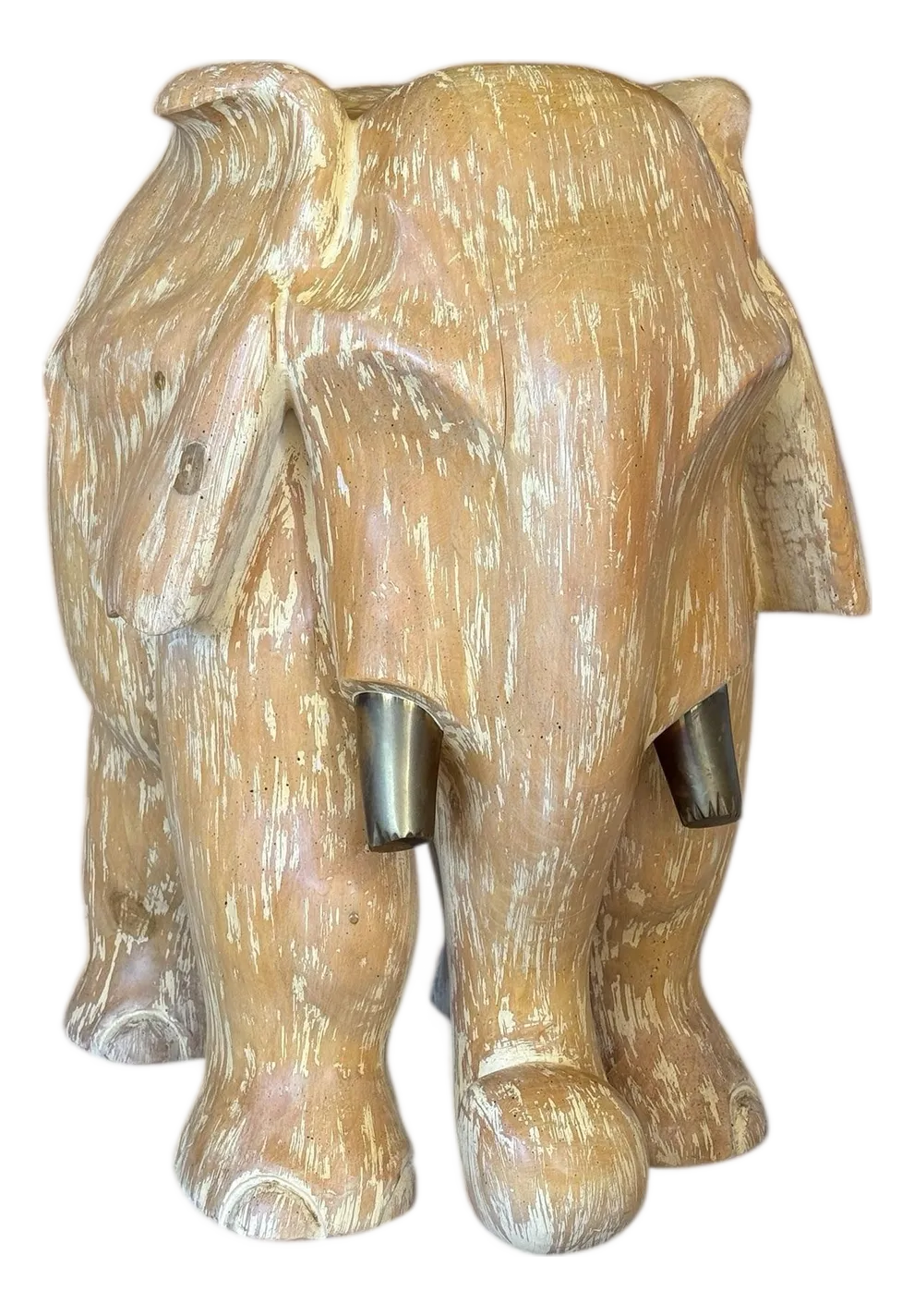 Close-up of a hand-carved elephant sculpture.