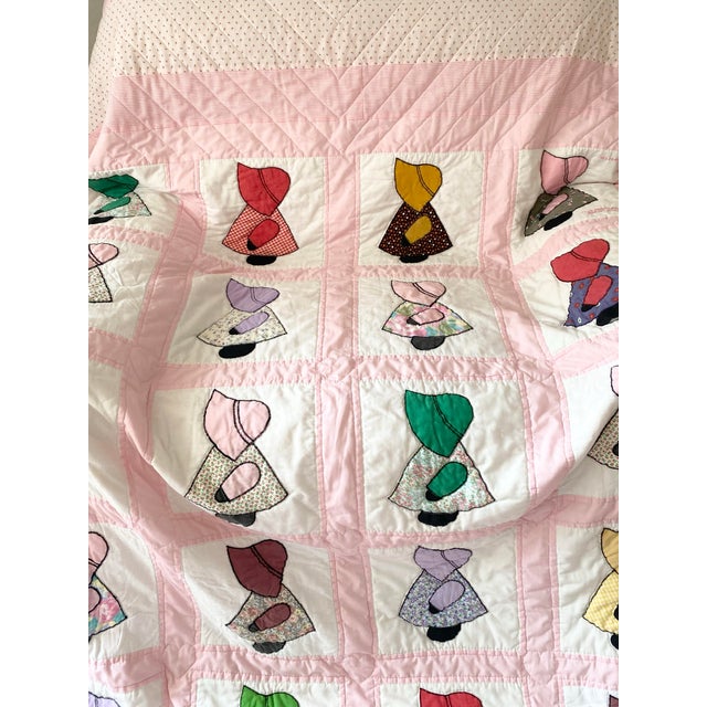 This adorable vintage 80s Sunbonnet Sue quilt is in excellent condition! You can easily see the amount of care that was...
