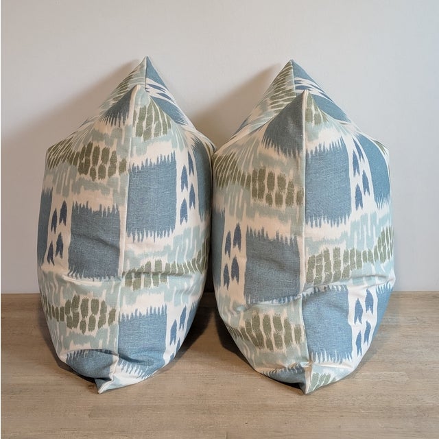 Cowtan & Tout Sarafan pillows in delft (blue & green). Cotton/linen blend warp print has some texture, and the ikat is...