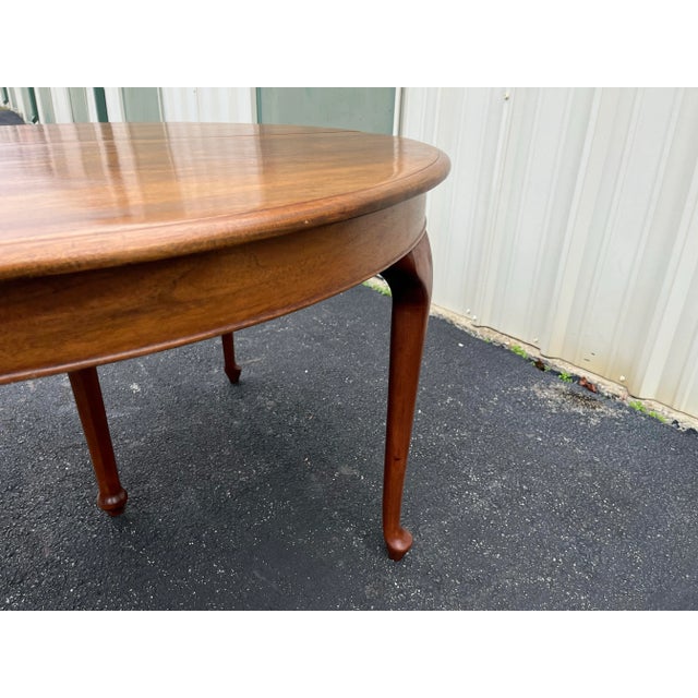 Antique Early American Oak Extension Dining table. Set on a unique and attractive five-legged design. Four feet in...