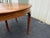 Antique Early American Oak Extension Dining table. Set on a unique and attractive five-legged design. Four feet in...