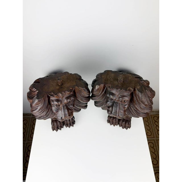 A magnificent pair of antique Italian hand-carved wooden lions. Rich in character and craftsmanship, these impressive...