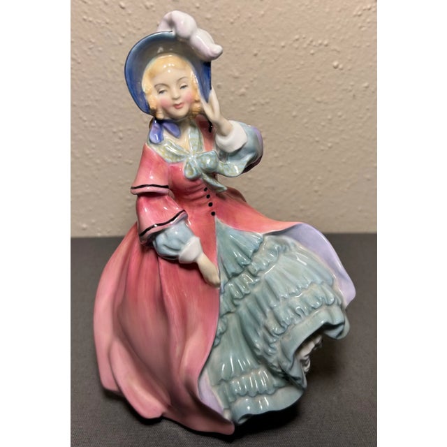 Up for sale is a Vintage 1940-1973 English Royal Doulton Porcelain Spring Morning Figurine (HN 1922) (Retired)! It...