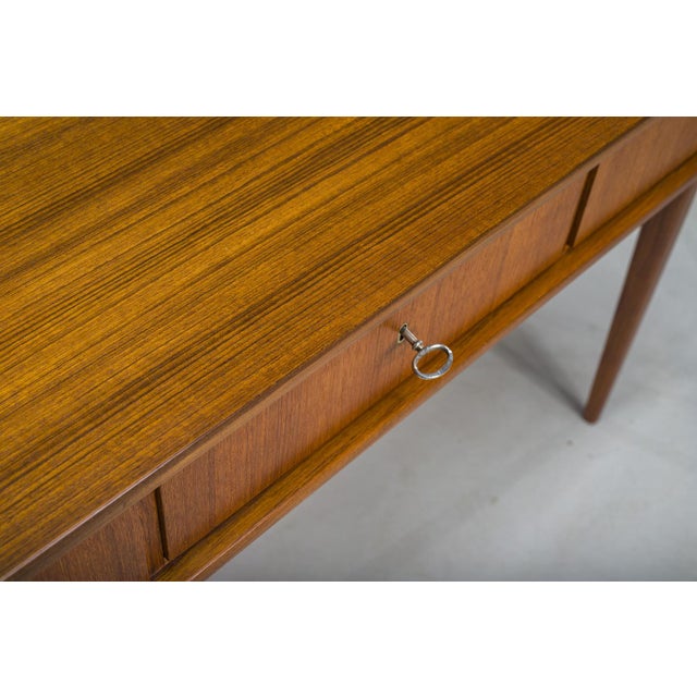 This desk is designed and manufactured by Bartels Werke in Germany in the 1960s. The design is inspired by iconic Danish...