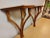 Interesting pair of solid wood wall brackets with an open design. Can be used next to each other to support a piece of...