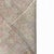 An antique hand-knotted Azeri rug, professionally antique washed to create a beautifully faded palette of warm beige, soft...
