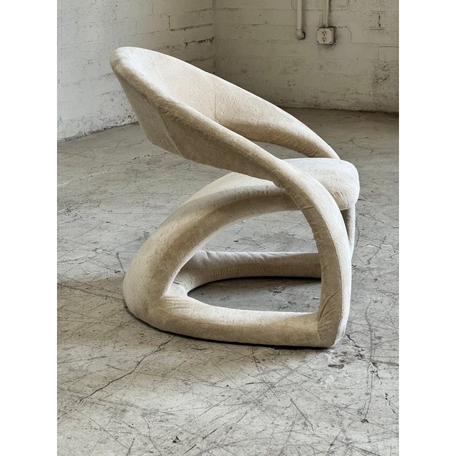 Vintage upholstered postmodern "Tongue Chair", featuring curvy lines and soft velvet textured fabric. In excellent vintage...