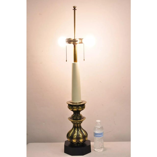 Vintage Stiffel Hollywood Regency Brass Baroque Candlestick Table Lamp On Metal Base. Circa Late 20th Century....
