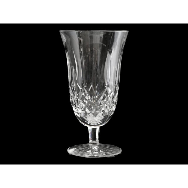 Set of three mid 20th century Waterford crystal stemmed iced tea glasses in the iconic Lismore pattern. The elegant forms...