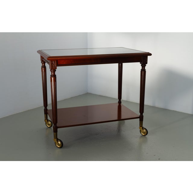 Danish Hepplewhite Mahogany Serving Trolley by Farre Møbelfabrik, 1970s. Elegant serving cart with glass top in solid and...