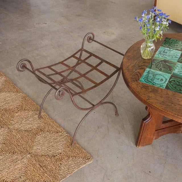 Lovely curule iron stool from France, 1920s. Curvy wrought iron body with loop detail. Seat ready to be upholstered....
