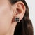 These Art Deco-inspired square halo earrings feature 1.60 carats of deep blue square-cut sapphires framed by 0.73 carats...