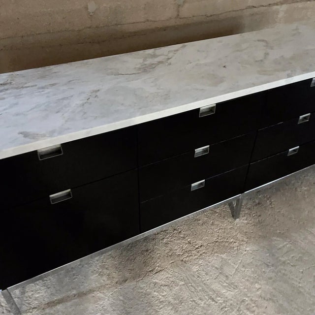 AMBIANIC presents 1960s Knoll Credenza Florence Knoll design no label Marble Ebonized Wood Chrome 26 h x 18 d x 74.63...