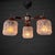 Scandinavian ceiling lamp with three arms, produced by an unidentified Swedish manufacturer in the 1950s. Executed in a...