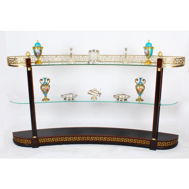 This is a magnificent vintage walnut and ormolu mounted Versace curved glass display unit, circa 1990s in date. This free-...