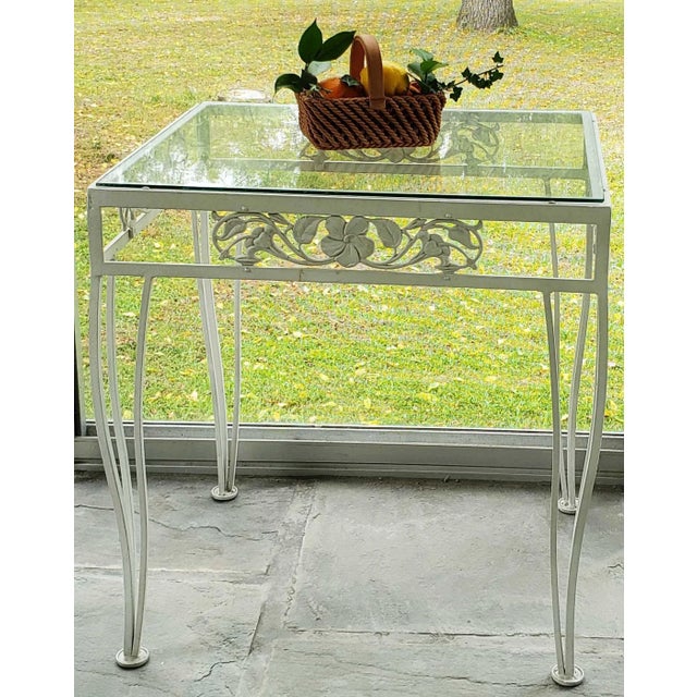 Dining Table with four chairs plus serving table. Purchased late 1950's early 1960's. Hibiscus pattern on chairs...