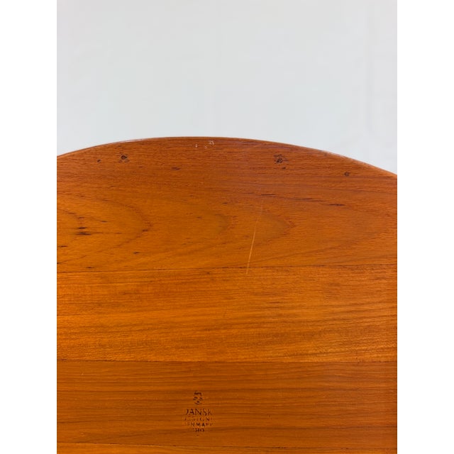 A substantial oval teak serving tray by Dansk, made in Denmark, with beautifully flowing lines and the warm, expressive...