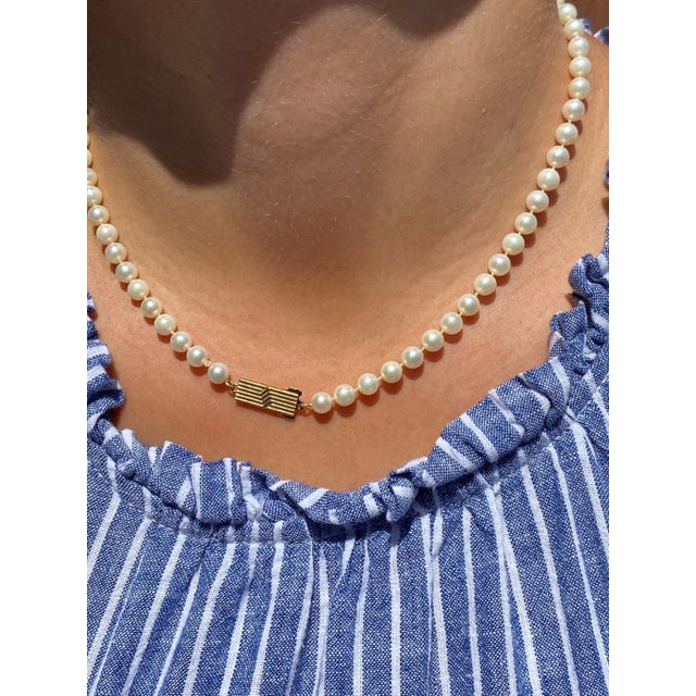 Mid 20th Century The Miki: Mikimoto Pearl Strand with Yellow Gold Mid Century Clasp For Sale - Image 5 of 6