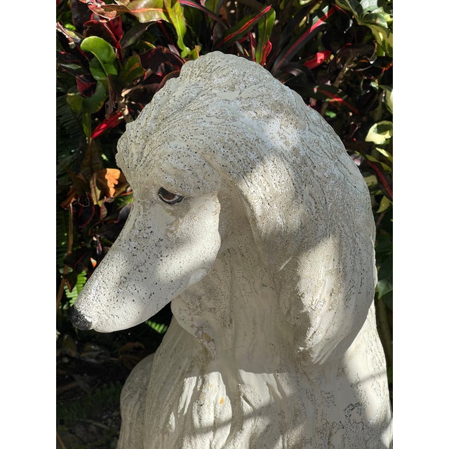 Beautiful vintage dog sculpture, 3 ft tall. Made of concrete, hollow inside, With signs of age on the surface
