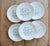 Marie-Claire pattern dinner plates, recognizable by their delicate design of small pastel flowers on slender black stems....