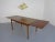 Double extendable rosewood dining table from the 1960s. Height 74.5 cm. Width 140-247 cm. Depth 90 cm.