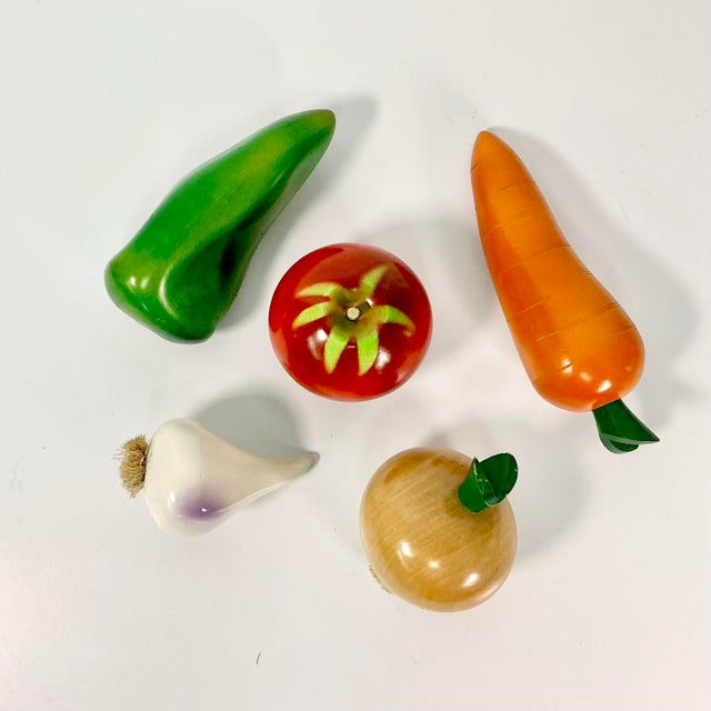 These are a delightful find. A set of 5 hand carved and painted wood vegetables including a green pepper, orange carrot,...