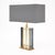 Murano glass gray “tormalina” slab lamps with beautiful brushed brass structures. We love the hand-blown slab glass...