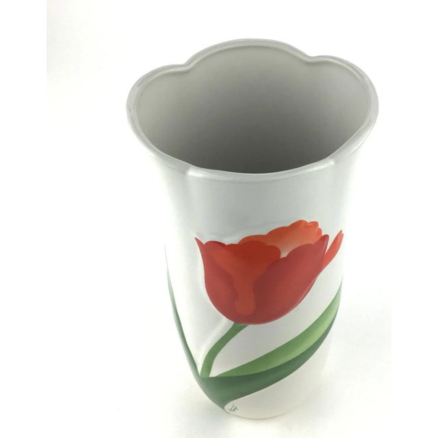 Striking yet simplistic and vibrant piece of art. I can’t make out the designer, but we love the contrast colors. In gift...