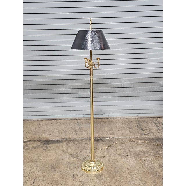 The product is a vintage French Horns Bouillotte Brass Floor Lamp with a black shade. Standing at 59 inches tall, this...