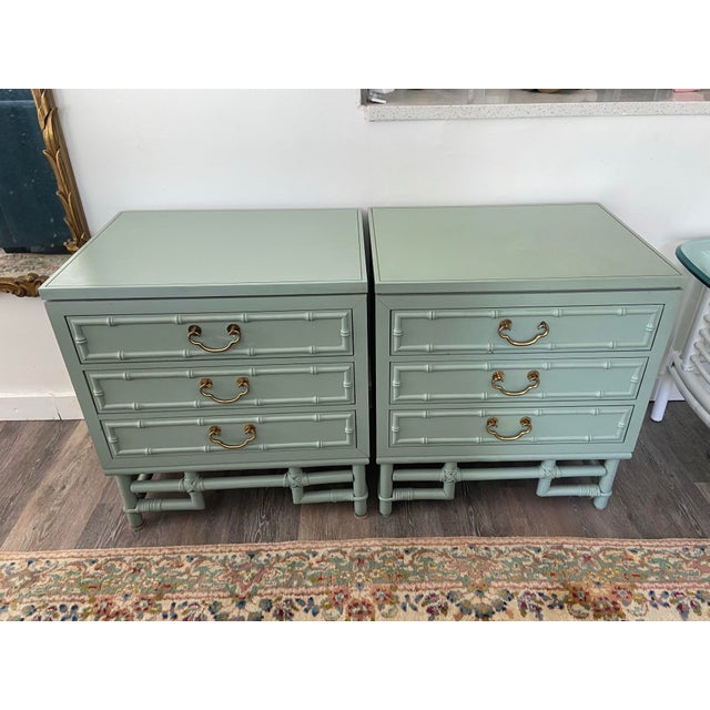 Offered is a pair of luxury high end vintage night stands. Three-drawer cabinet structure, signature geometric bamboo...
