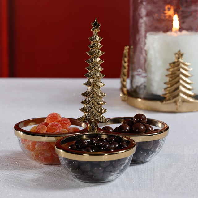 Celebrate festive gatherings with this charming three-part condiment set, combining clear glass bowls with a sculptural...