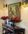 Beautiful, with full, lush reds that rest softly on a bed of pine sprigs. Complete with metal stand and red candelabrum....