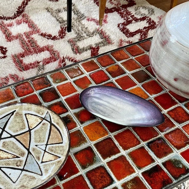 Decorative ceramic vide-poche by pol chambost (circa 1950s). Small yet elegant seashell-shaped form with white base and...