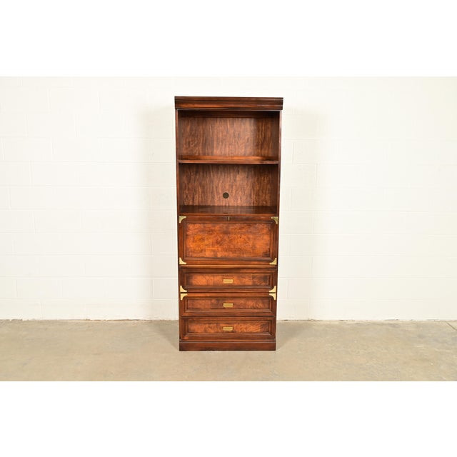 A gorgeous Mid-Century Modern Hollywood Regency Campaign bookcase with drop front secretary desk In the manner of Henredon...