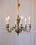 This 20th-century French bronze chandelier reflects a classical design vocabulary executed in solid cast bronze. The...