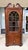 This 18th Century Inlaid Mahogany Corner Cabinet features an elegant arched glass door, graceful scroll pediment, and...