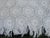 A hand crocheted bedspread with exceptional detail.