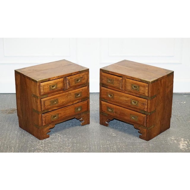 This pair of Vintage Military Campaign Bedside Tables Each piece features sturdy construction, complete with brass...