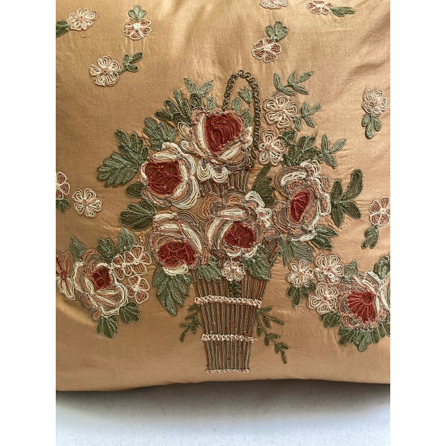 A retro inspired floral bouquet basket embroidered by hand decorative pillow cover. The base fabric is in 100% silk luxe...