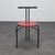 This eye-catching set of four dining chairs from the 1980s captures the bold spirit of postmodern design. Featuring a...