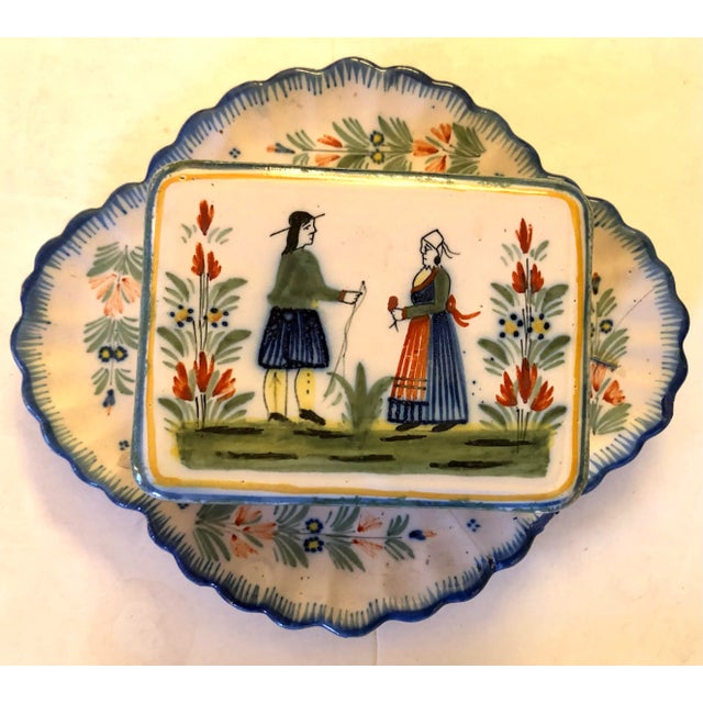 Circa 1920's, Henriot Quimper French Faience Art Pottery sardine box with handpainted depictation of a Breton man and...