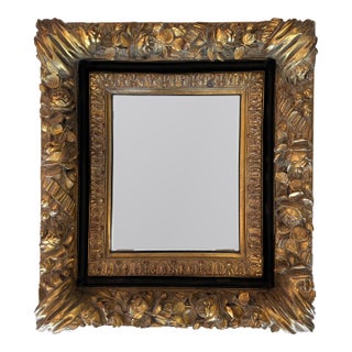 Ornate Gold and Black Deeply Carved Vintage Mirror For Sale