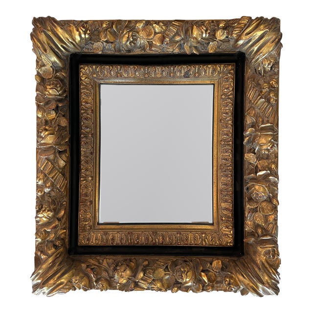 Ornate Gold and Black Deeply Carved Vintage Mirror For Sale