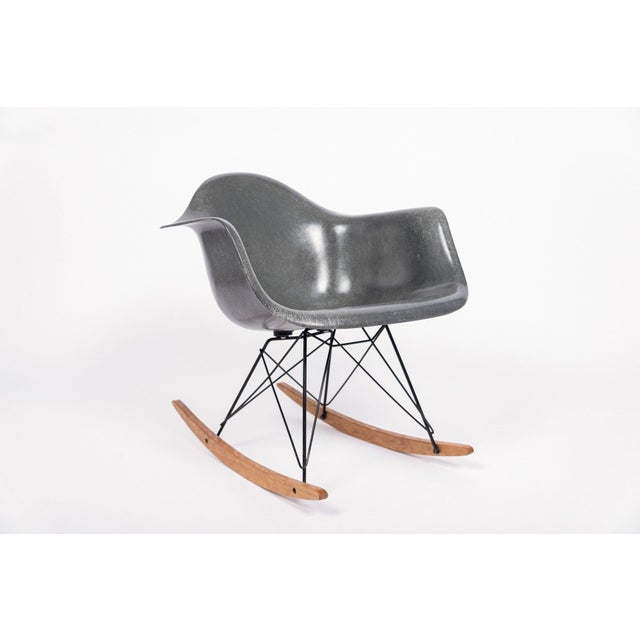 The iconic RAR chair - Rocking (R) Arm (A) Chair on Rod (R) Base - was designed by Charles & Ray Eames for Herman Miller...